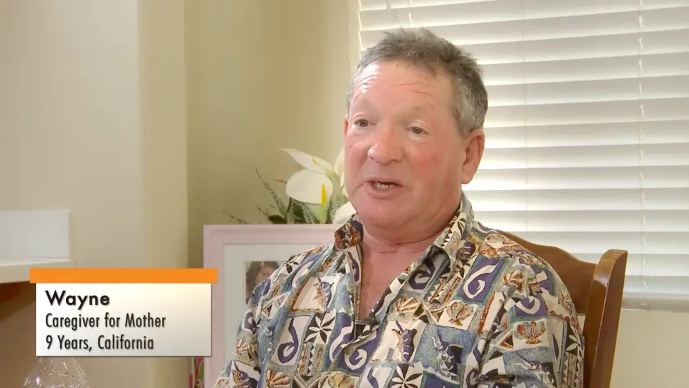 Caregiver Discussing Alzheimer’s Signs & Symptoms